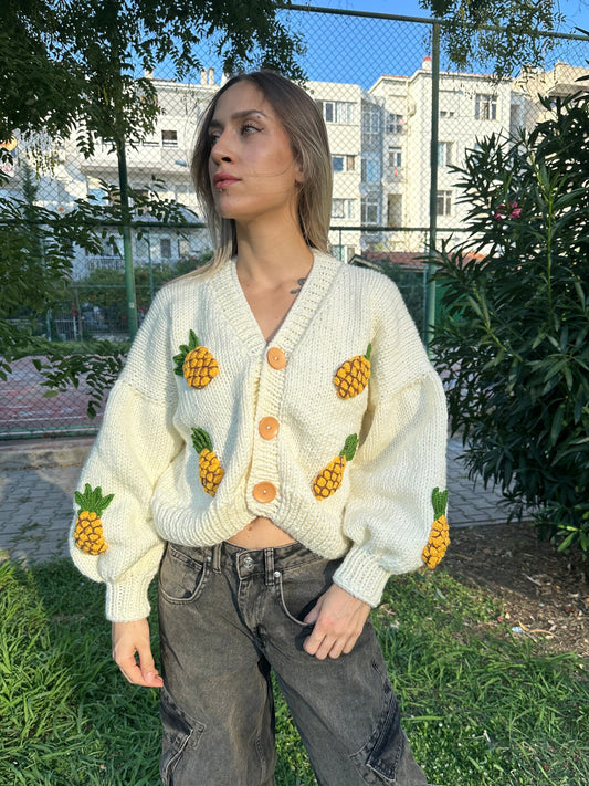 bone-colored sweater, pineapple sweater, cozy knitwear, tropical knit sweater, soft yarn sweater, playful knit design, handmade sweater, fun casual sweater, unique knitwear, stylish layering piece