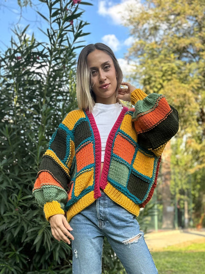 patchwork cardigan, cozy knitwear, colorful cardigan, soft yarn sweater, relaxed fit style, vibrant statement piece, must-have layering item, handmade charm, bold color combination, trendy fall fashion